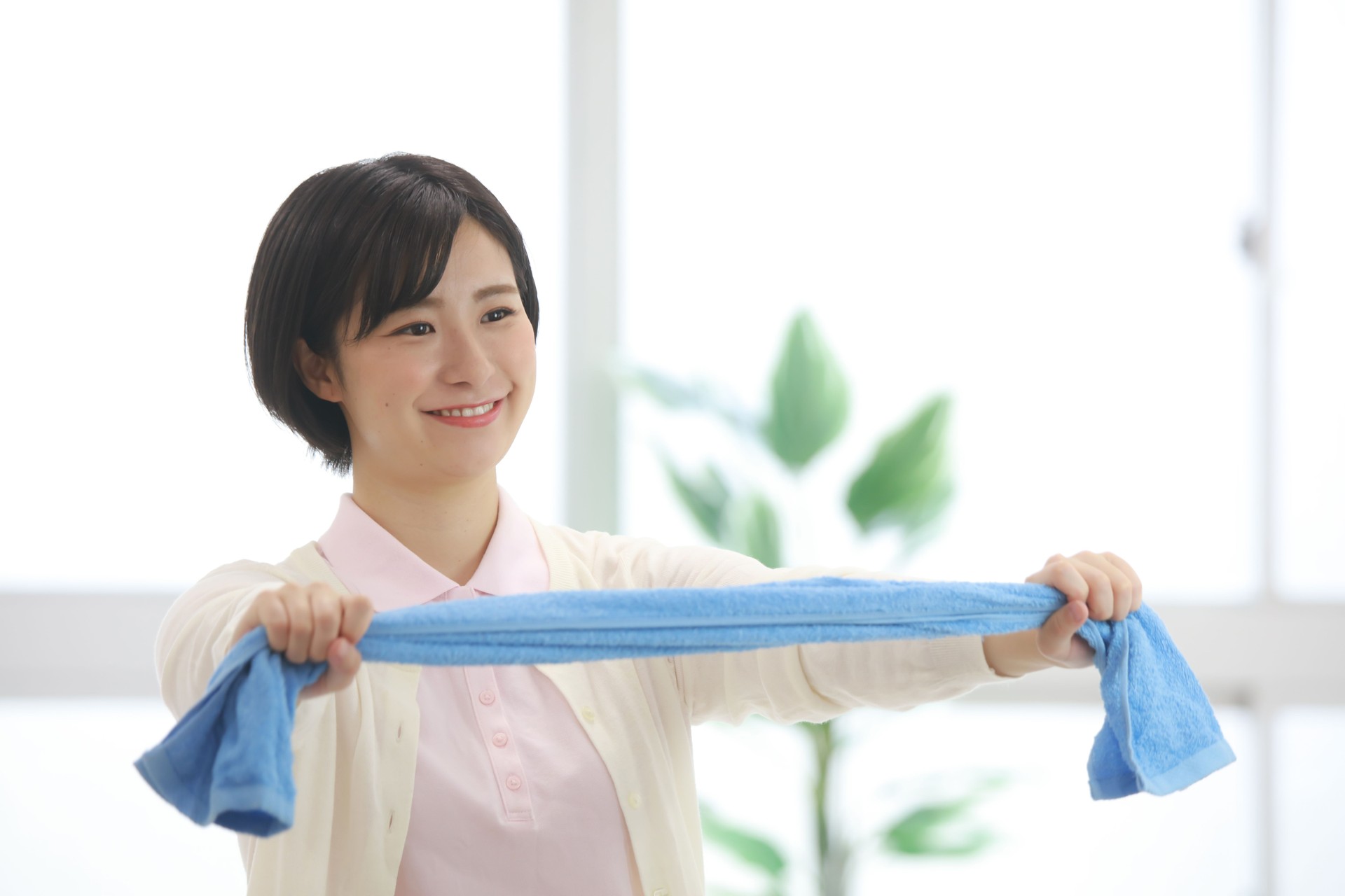 Image of a caregiver doing towel exercises